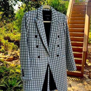 Plaid topcoat perfect for fall transition weather